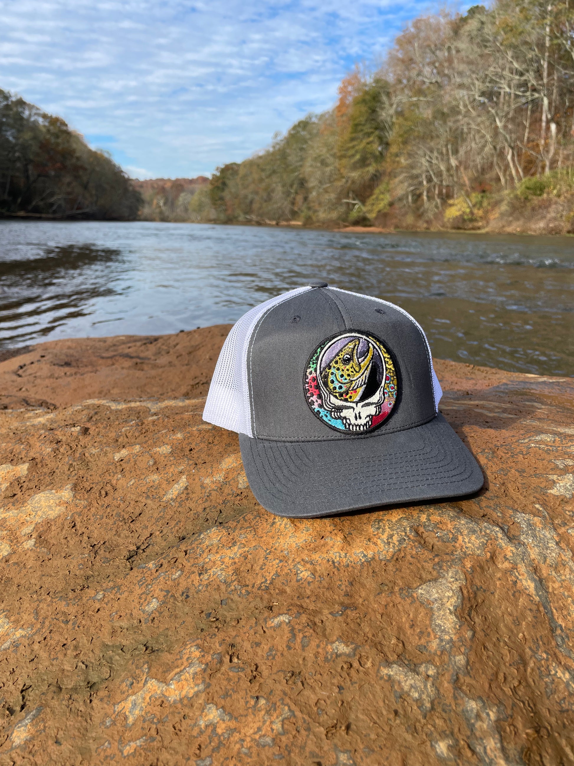 Steal Your Face Brown Trout Trio Classic Trucker Hat Gunmetal Gray River view Fishing Hat